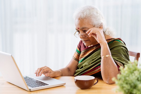 Older woman working on a computer