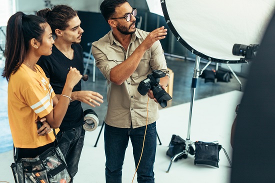 Photographers discussing a photo shoot