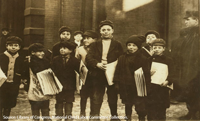 Young newsies (boys) at the newspaper office after school in Buffalo, New York, in 1910.