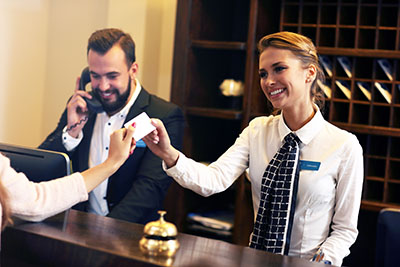 Concierge at a hotel helping guests